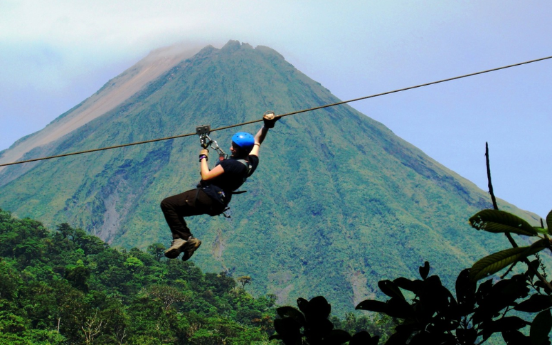 Zipline with volcano backdrop